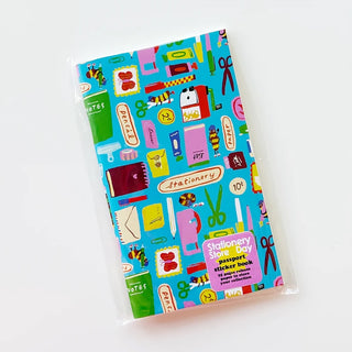 A sticker book featuring a bright blue cover covered in colorful stationery illustrations