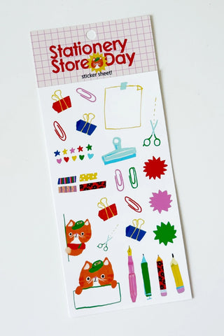 Sticker sheet of stationery themed items with cat wearing hat