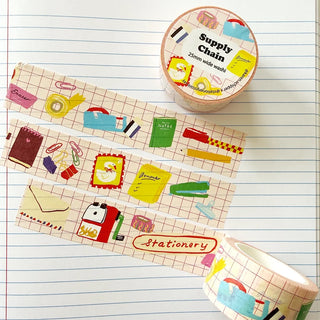 Washi tape with stationery themed items inside a lined notebook