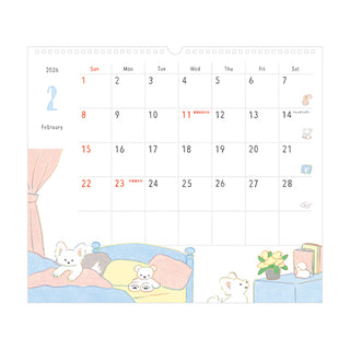 Calendar with cartoon design of a bedroom scene featuring dogs.