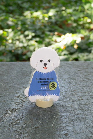 Mini die-cut Bichon Frise calendar stand, blue text, 2027 badge