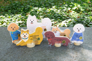 2027 mini die-cut calendar set with several dog designs on round bases