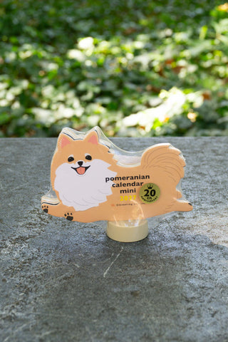 2027 Pomeranian mini die-cut calendar stand, orange dog face on small base