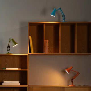 Wooden shelves with desk lamps in a room setting