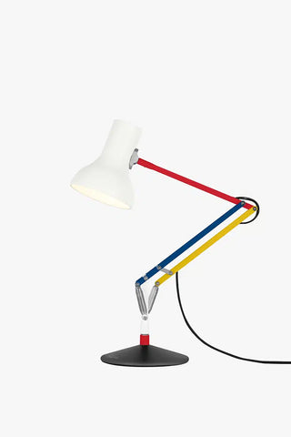 Colorful desk lamp with a white shade on a white background