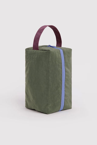 green baggu dopp kit with colorful accents