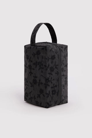 baggu dopp kit with black floral pattern