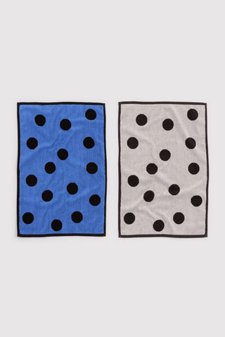 Set of baggu hand towels with polka dot pattern, featuring black and blue colorway and black and white colorway