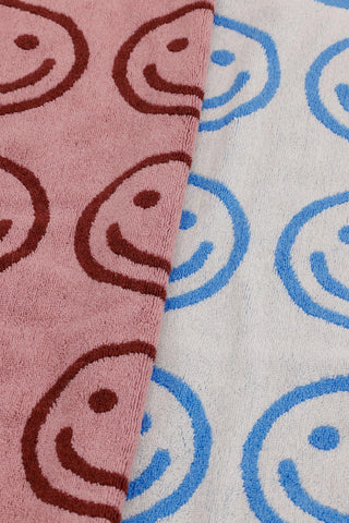 close up of baggu hand towels with smiley face pattern