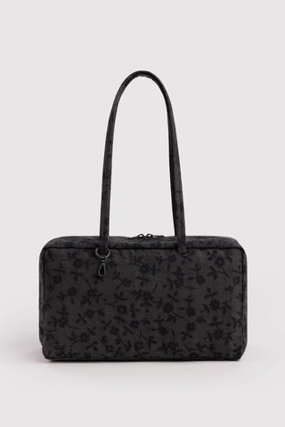 baggu medium bowler bag in black floral pattern on a light background