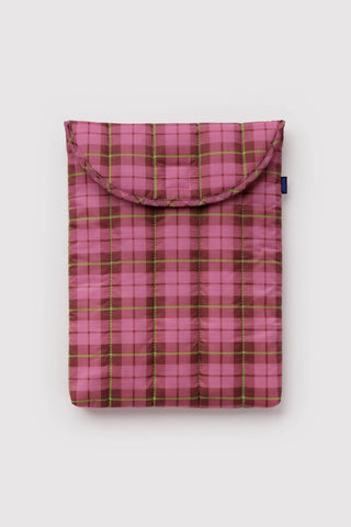 laptop sleeve with pink and green tartan pattern on a light background