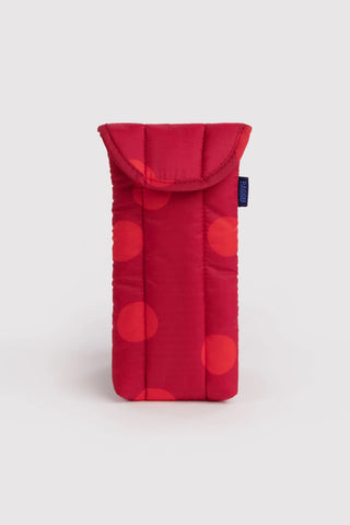 puffy glasses sleeve in red polka dot pattern on a light background