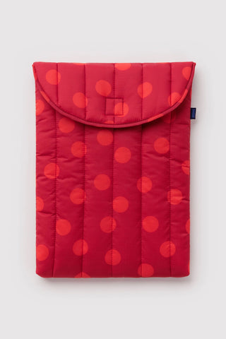 Baggu laptop sleeve with red polka dot pattern on a light background