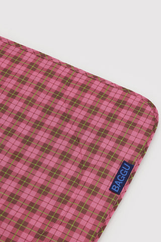 close up of baggu puffy picnic blanket in a pink tartan pattern