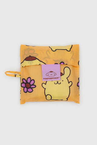 Yellow pouch with cartoon character and floral design on a white background