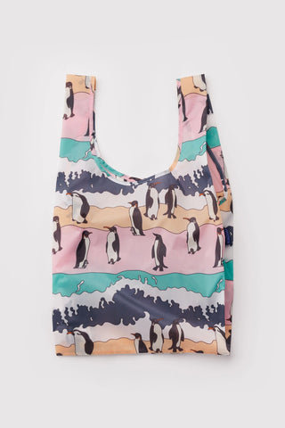 Reusable bag with colorful penguin design on a white background
