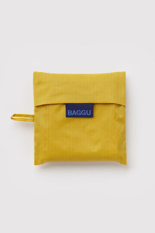 folded yellow baggu tote on a light background