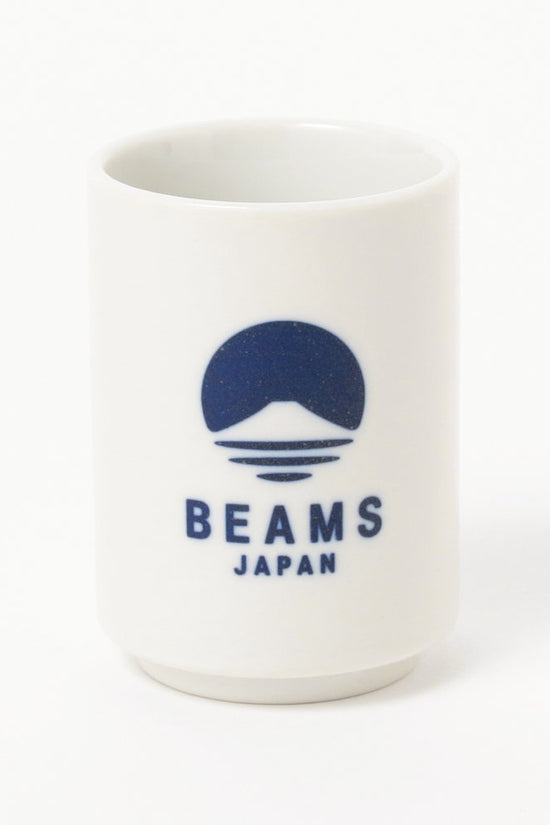 White mug with blue 'BEAMS JAPAN' logo on a white background