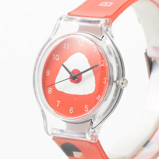 Red watch with rice ball design on the front on a white background