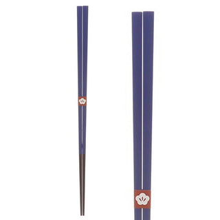 Pair of blue chopsticks on a white background