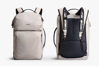 Two backpacks, showing front and back, on a white background.