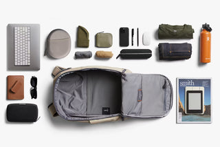 Opened workpack interior with multiple compartments and laptop sleeves.