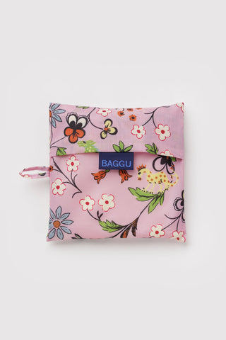 folded pink baggu tote with flowers and animals print