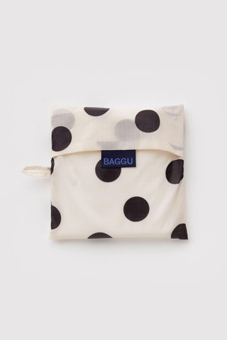folded big baggu tote with cream and black polka dots