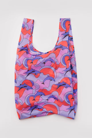 Colorful reusable bag with dolphin pattern on a white background