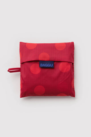 folded red baggu tote on a light background