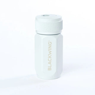 White pencil sharpener with 'BLACKWING' branding on a white background