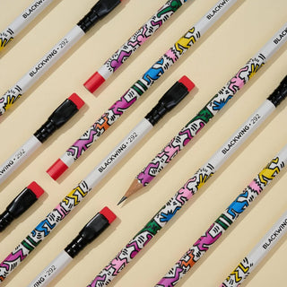 Blackwing 292 pencils with colorful designs on a beige background