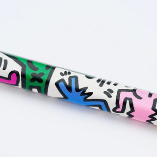 Colorful pencil with abstract design on a white background
