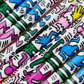 Colorful, abstract patterned pencils arranged in a row.