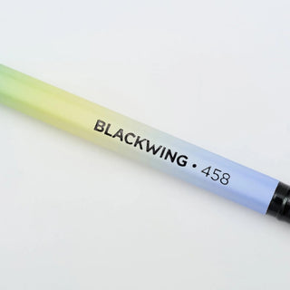 Gradient pencil with 'Blackwing 458' label on a white background