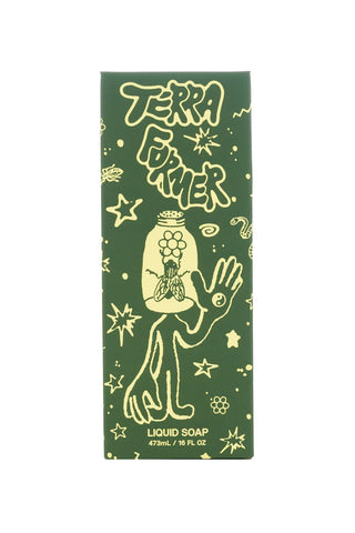 Terra Former scent liquid soap packaging with green background and yellow graphics