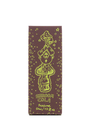Shroom Cola perfume packaging with mushroom illustration on a white background