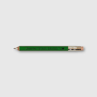 Green wooden pencil with Camel branding on a light gray background