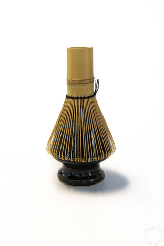 Bamboo whisk holder on a white background