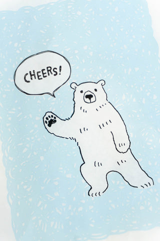 Polar bear with a 'Cheers!' speech bubble on a light blue background