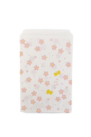 Small pouch with floral pattern on a white background
