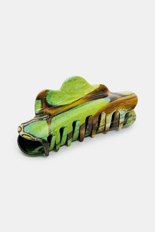 Claw clip with green malachite butterfly pattern on a white background