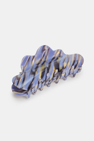 Black and light blue claw hair clip on a white background