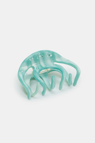 Large light blue claw clip with water droplet designs