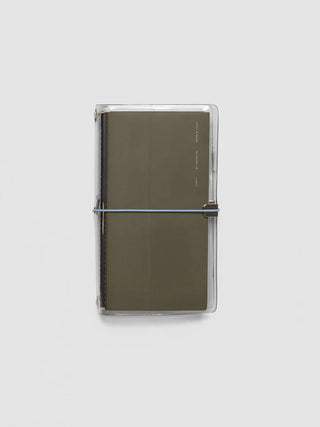 Brown/olive travel cover with horizontal elastic band and clear outer sleeve