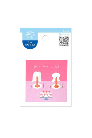 Product packaging with cartoon dogs eating spaghetti and pink background 