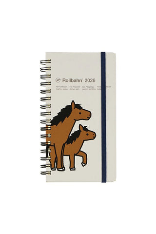 Notebook with horse illustration and 'Rollbahn' branding on a white background