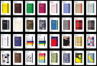 Assorted colorful notebooks with different covered numbered 001 - 032