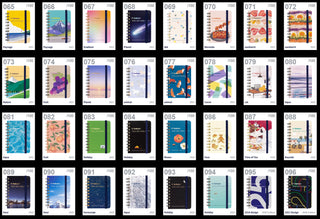 Assorted colorful notebooks with different covered numbered 065 - 096