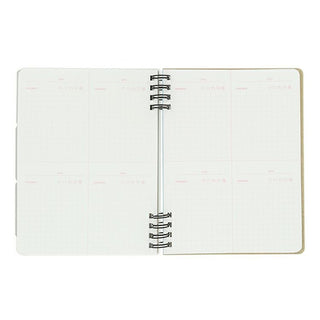 Open notebook with spiral binding on a white background